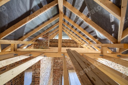 Preview: Attic of a building under construction with wooden beams of a roof
