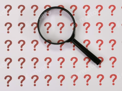 Preview: Paper with question mark symbols and magnifying glass.