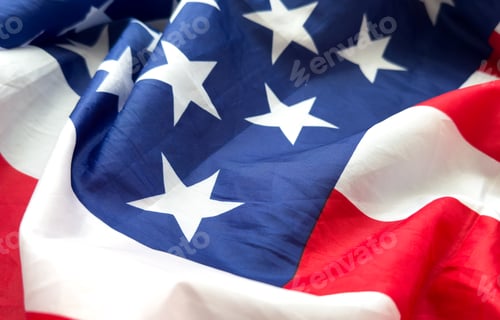 Preview: Close up of ruffled American flag. Satin texture curved flag of USA. Memorial Day or 4th of July