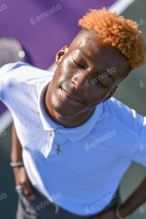 Preview: Close up portrait of handsome young man with his eyes closed