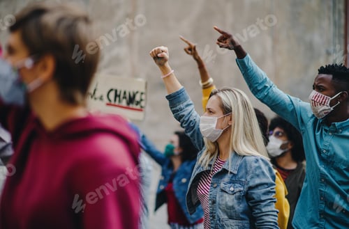 Preview: Group of people activists protesting on streets, strike and demonstration concept.