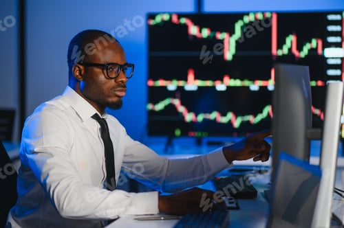 Preview: Financial Analyst Working on Computer with Multi Monitor Workstation with Real Time Stocks