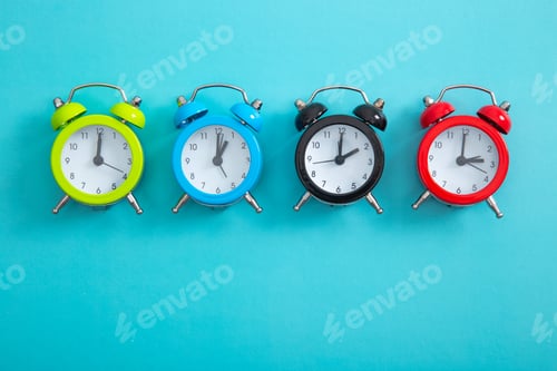 Preview: Alarm clock on a color background.