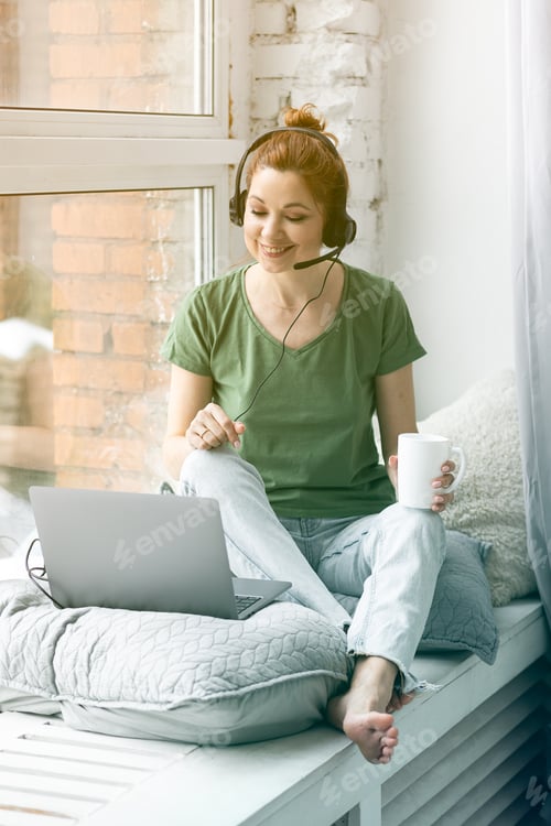 Preview: Woman Working Remotely from Home with Laptop