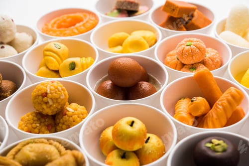 Preview: Rangoli design of Assorted Indian sweets