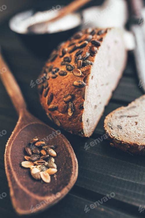 Preview: Delicious fresh bread on wooden background