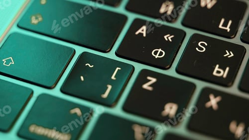 Preview: Close up of laptop or computer keyboard. Action. Concept of modern devices and technologies, buttons