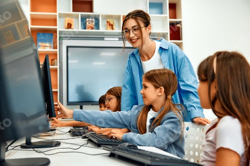 Preview: Children learning in a school classroom