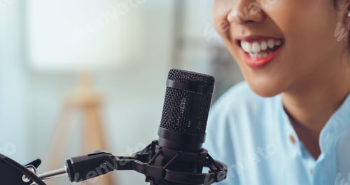 Preview: Woman use microphones wear headphones with laptop record podcast. Content creator concept.