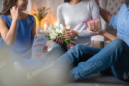 Preview: Happy mother's day! Close up shot of happy family celebrating mothers day.