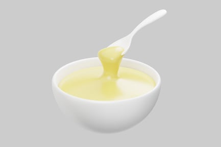 Vista previa: Salsa de vainilla con cuchara