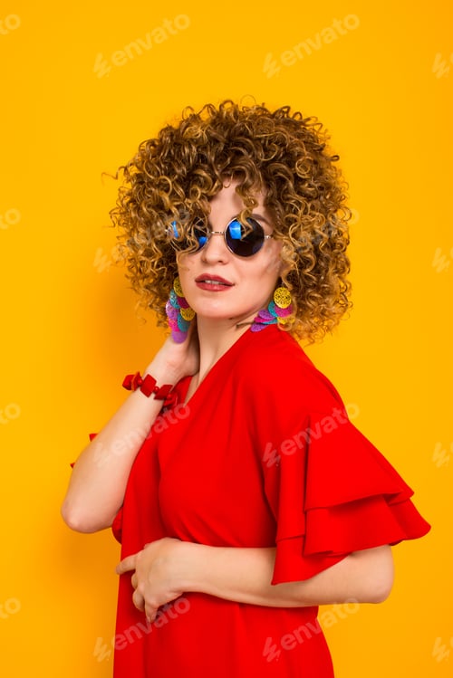 Preview: Attractive woman with short curly hair