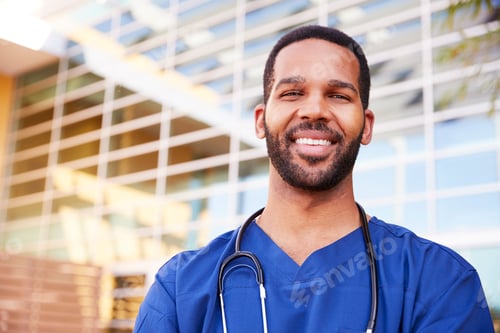 Preview: Smiling Man Doctor with Stethoscope Outdoors