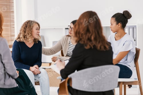 Preview: Women with issues supporting together during group therapy