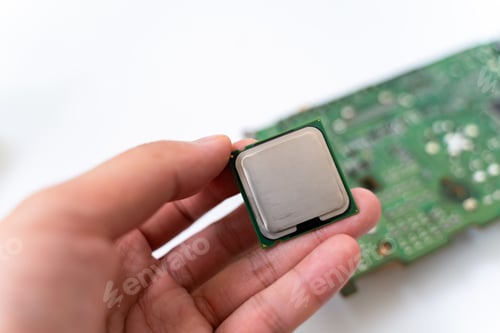 Preview: IC CPU in hand with PCB board background. Concept of Technology computer and hardware computer.