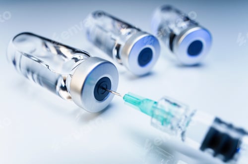 Preview: Injectable medications in sealed vials and a disposable plastic medical syringe