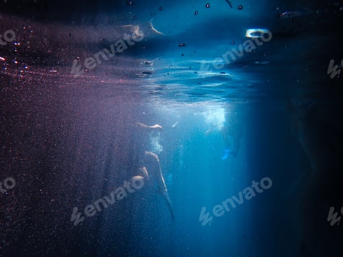 Preview: Underwater shot of a people in the water