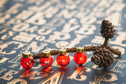 Preview: Christams gold pine conre and red glass ball decoration on vintage type pattern table.