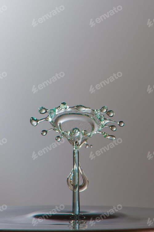 Preview: Splash of colorful liquid with high speed flash