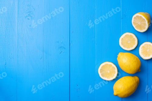 Preview: Fresh Lemons on a Blue Wooden Background