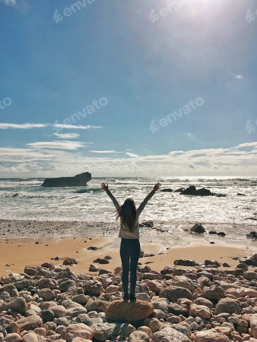 Preview: Beautiful slender girl enjoys the waves of the ocean