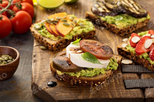 Preview: Variety of avocado toasts on a cutting board