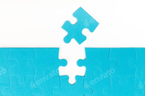 Preview: Puzzle piece being placed to complete the blue puzzle on a light background
