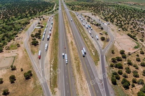 Preview: Panoramic aerial horizontal view of rest area truck stop on the car parking endless Interstate high