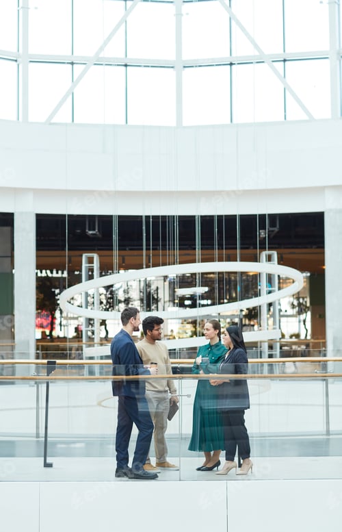 Preview: Business People in Modern Glass Building Wide Angle