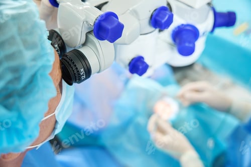 Preview: Close up photo of doctor doing surgery