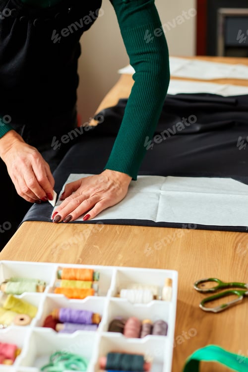 Preview: Step by step, Woman dressmaker female making sewing patterns
