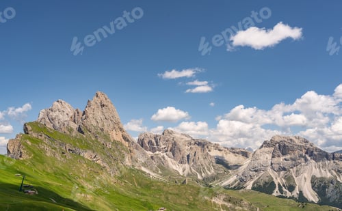 Preview: Beautiful Alps with green mountain hill under sky