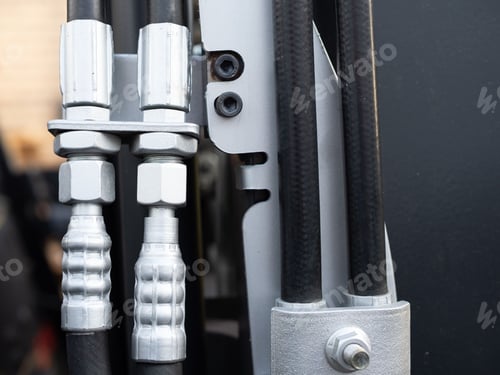 Preview: closeup of hydraulic hoses on a fork lift truck