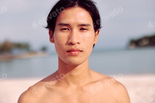 Preview: Muscular Asian Man Running on Sandy Beach at Sunset: Fitness and Freedom