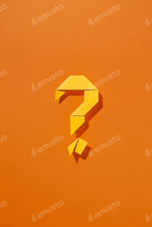 Preview: Colorful yellow origami question mark with shadow on orange