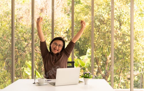 Preview: Business woman in nature background office