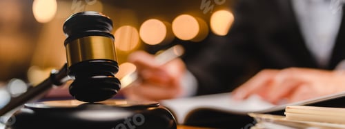 Preview: businessman or legal expert reviewing document reports at office workplace with computer laptop
