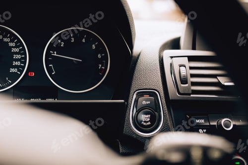 Preview: close up car interior with start engine button details. modern electric hybrid car