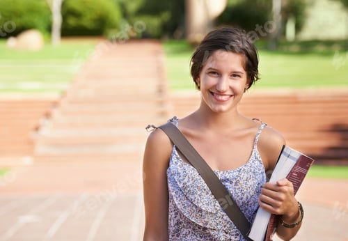 Preview: Preparing for a bright future. A beautiful young student standing on campus smiling at the camera.