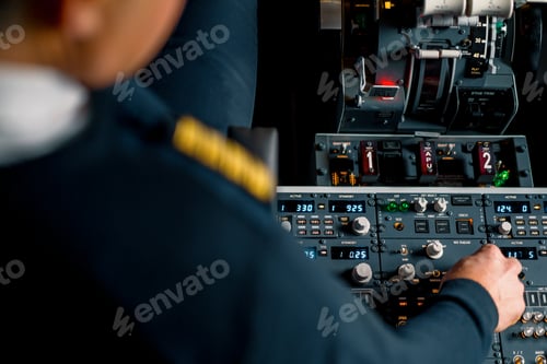Preview: The captain presses the buttons on the control panel to start the engine of the plane flight