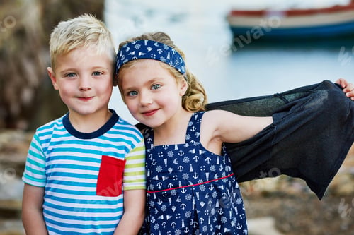 Preview: Double the cuteness. Portrait of a cute little brother and sister posing together on a day out.