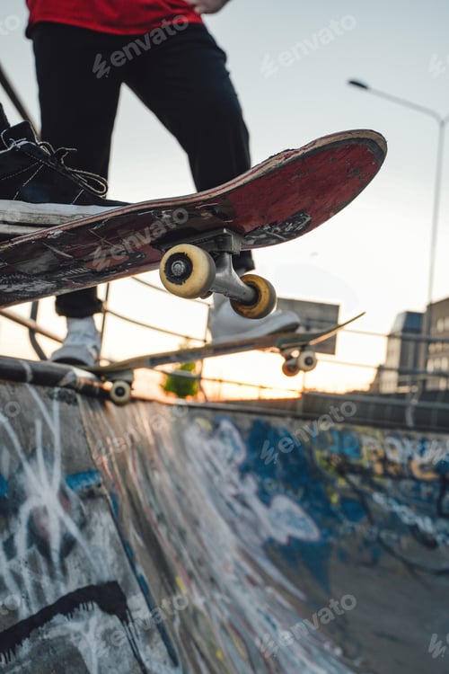 Preview: Two skateboarders at skate park in daytime outdoors