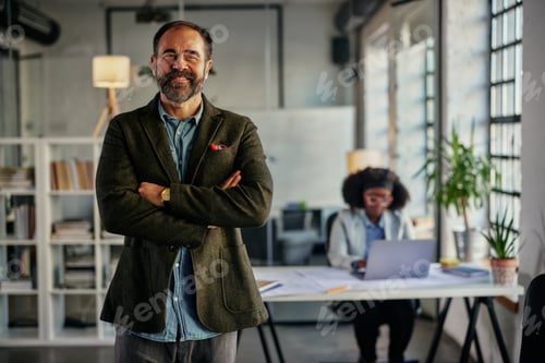 Preview: Portrait of businessman in business environment