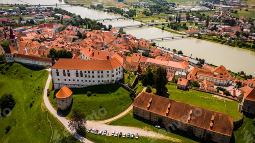 Preview: Aerial drone view of Ptuj townscape in Slovenia by river Drava