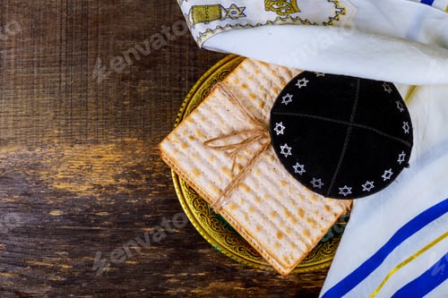 Preview: Jewish holiday passover matzot with seder on plate on table close up