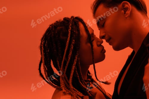 Preview: side view of young and sensual interracial couple, charismatic man and charming african american