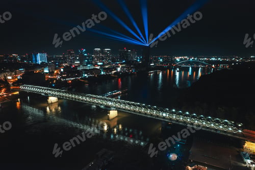 Preview: Aerial night shot of Bratislava city, bridges over the Danube river, and the vibrant nightlife