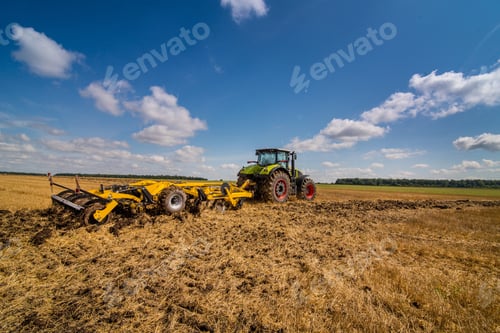 Preview: tractor with a disc cultivator, a system for processing soil