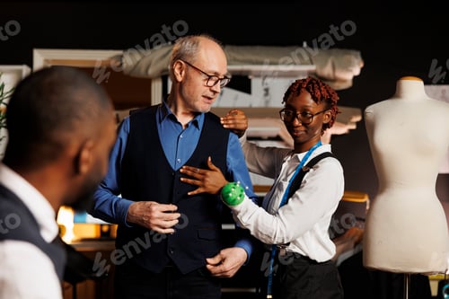Preview: Tailor Fitting Vest on a Client in Workshop