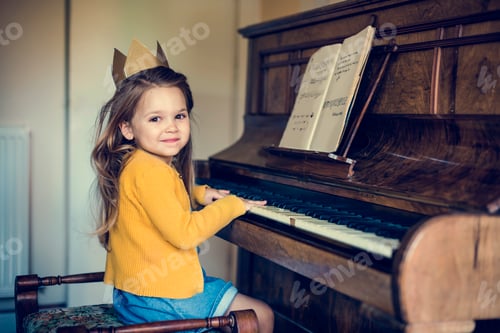 Preview: Little Girl Playing Piano Wearing a Crown